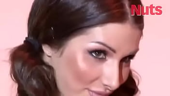 Busty brunette lucy pinder shows off her stunning cleavage for a photoshoot