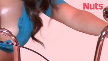 Busty brunette lucy pinder shows off her stunning cleavage for a photoshoot