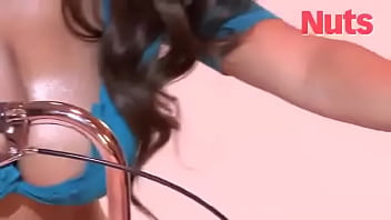 Busty brunette lucy pinder shows off her stunning cleavage for a photoshoot