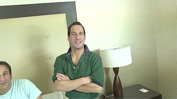 Surrounded by several men she sucks as many cocks as she can and then gets fucked and