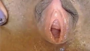 Ebony cam cutie with a toy