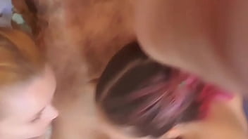 Sharing the boss's dick with her friend in a boundless blowjob