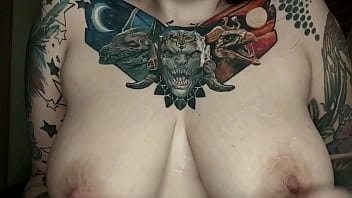 Hot tattooed slut fucks her big ass with a big dildo