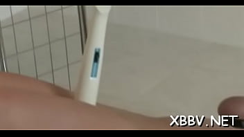 Sultry floozy is testing a sextoy