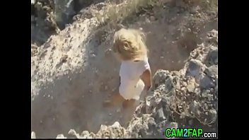Awesome blonde naked the beach