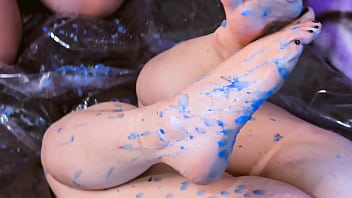 Dripping hot candle wax on my soles and toes