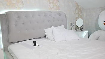 A student with big tits undresses on camera after studying