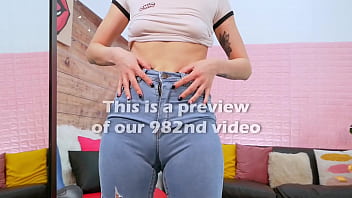 Amazing big butt on a skinny babe trying very tight jeans