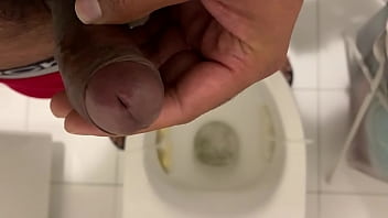 Brown guy masturbating in bathroom