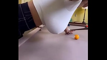 A man fucks a whore in a billiard room