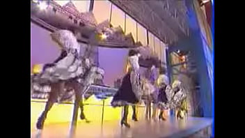 Girls dance and kick on stage showing upskirts