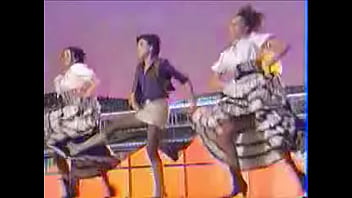 Girls dance and kick on stage showing upskirts