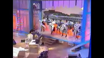 Girls dance and kick on stage showing upskirts