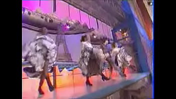 Girls dance and kick on stage showing upskirts