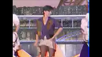 Girls dance and kick on stage showing upskirts