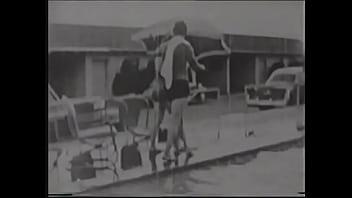 Gorgeous chick enjoys caresses with a guy by the pool