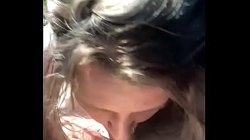 Thick hooker gives a blowjob in public then lets a guy cum all over her face