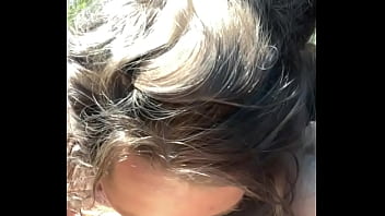 Thick hooker gives a blowjob in public then lets a guy cum all over her face