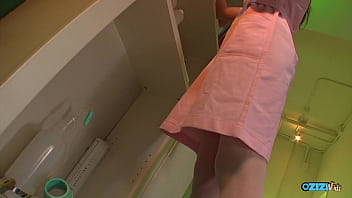 The charming asian cosplay nurse attired in pink provides