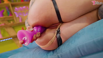 Anal goth slut plays with huge toy in her asshole