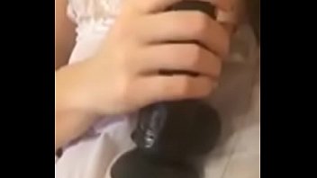 Girl with a dildo and phone cam