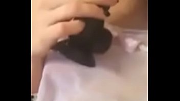 Girl with a dildo and phone cam
