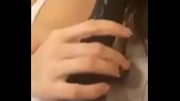 Girl with a dildo and phone cam