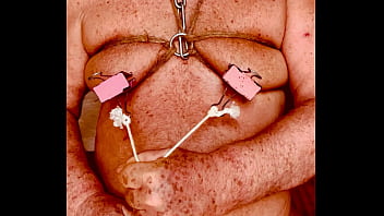 Seniormasochist pulls nipple clamps off