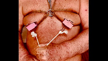 Seniormasochist pulls nipple clamps off