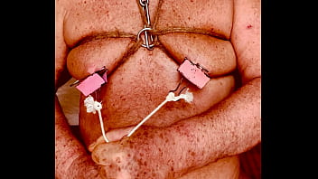 Seniormasochist pulls nipple clamps off