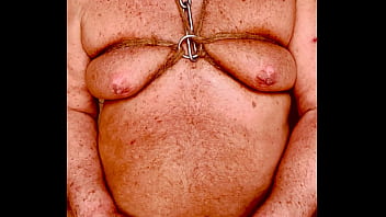 Seniormasochist pulls nipple clamps off