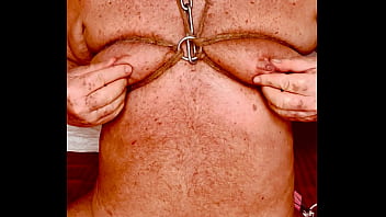 Seniormasochist pulls nipple clamps off