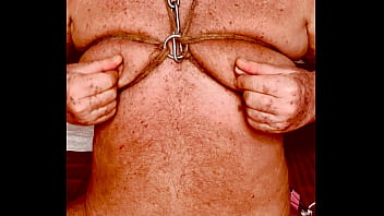 Seniormasochist pulls nipple clamps off