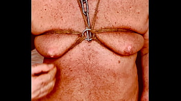 Seniormasochist pulls nipple clamps off