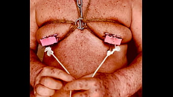 Seniormasochist pulls nipple clamps off