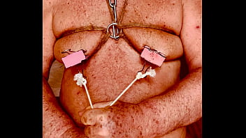 Seniormasochist pulls nipple clamps off