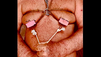 Seniormasochist pulls nipple clamps off