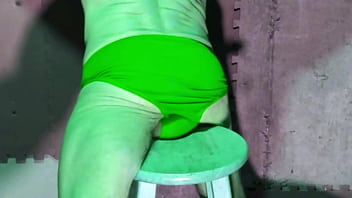 Preview stretching in basement on stool in briefs color changing