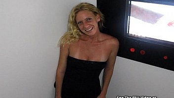 Blondie milf with small tits sucks off glory hole