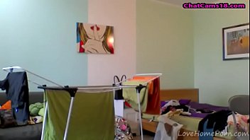 Naked milf taking care of her laundry