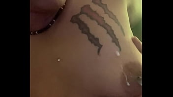 What is she doing to her tits