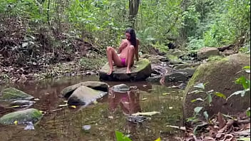 Latina from the countryside rubs her natural and hairy pussy outdoors and the stranger can't stand to watch it anymore until