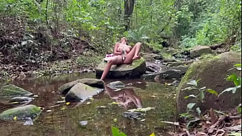 Latina from the countryside rubs her natural and hairy pussy outdoors and the stranger can't stand to watch it anymore until