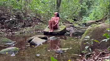 Latina from the countryside rubs her natural and hairy pussy outdoors and the stranger can't stand to watch it anymore until