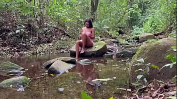 Latina from the countryside rubs her natural and hairy pussy outdoors and the stranger can't stand to watch it anymore until
