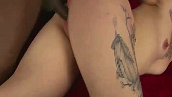 Black dick fucks tattooed slut