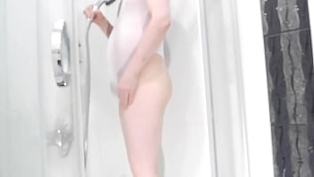 Solo boy in white swimsuit masturbate in shower