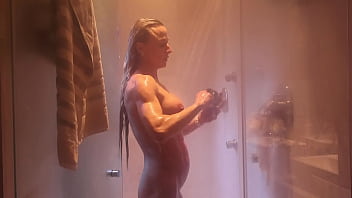 Blonde muscle milf in the shower—playing with her perfect body