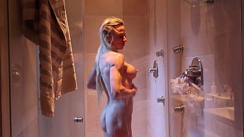 Blonde muscle milf in the shower—playing with her perfect body