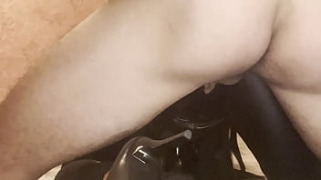 A dominant woman in black latex was fucked hard and cummed on her ass